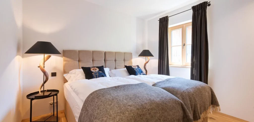 Slaapkamer van appartement 3 van Chalet Marmotta Neve St Anton